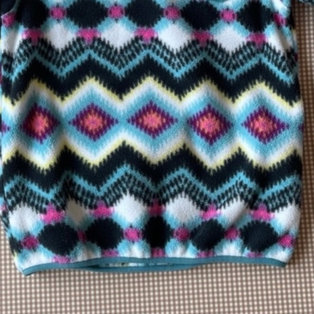 Patagonia Synchilla Snap-T tribal print fleece pullover.
Size XL. 14 years - Picture 12 of 15